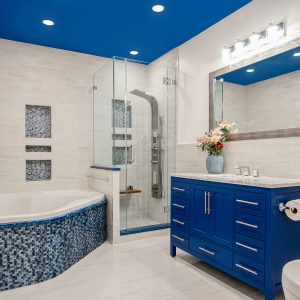 blue wooden cabinet near white wall