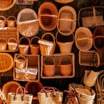 brown woven baskets on white table